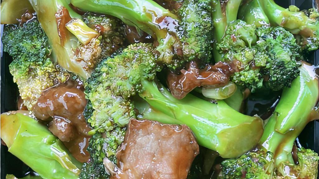 Beef Broccoli · Tender beef sauteed with broccoli and carrots in a brown sauce.