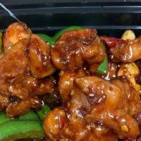 Kung Pao Chicken · Dark meat chicken Sauteed bell pepper, onion in spicy brown sauce with peanut.