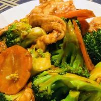 Chicken With Broccoli · White meat chicken sauteed with broccoli and carrots in a brown sauce.