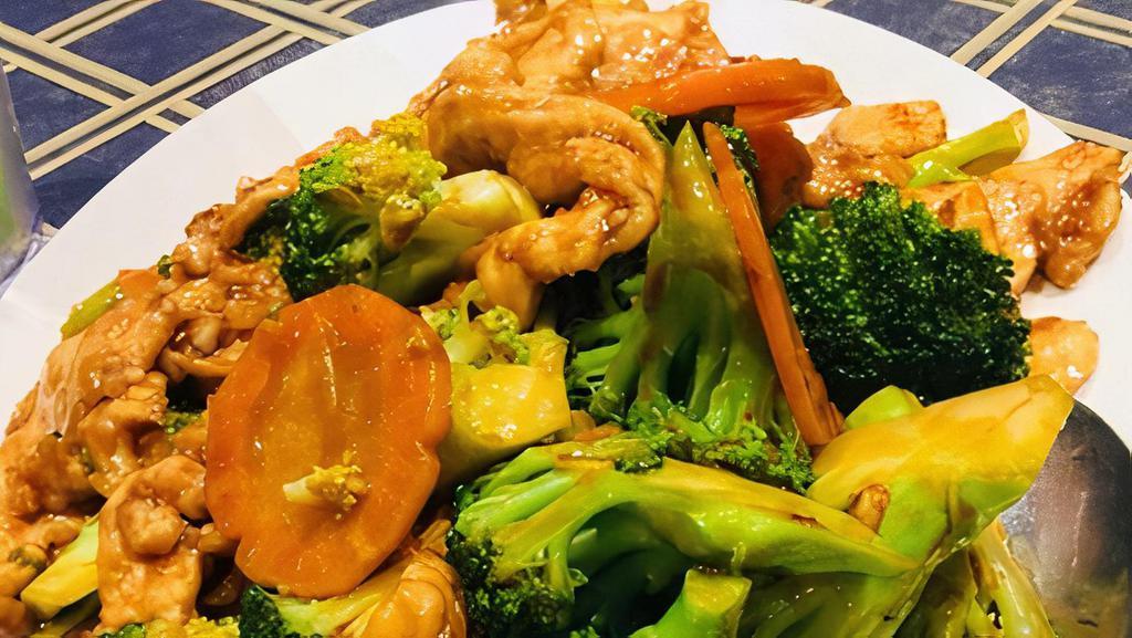Chicken With Broccoli · White meat chicken sauteed with broccoli and carrots in a brown sauce.