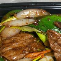 Mongolian Beef · Sauteed beef with scallions, yellow onions and bell peppers.