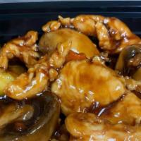 Chicken With Mushroom · Tender white meat chicken sauteed with assorted vegetables in a brown sauce.