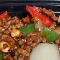Kung Pao Beef · Tender sliced beef sauteed in a spicy brown sauce with peanuts.