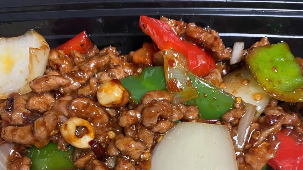 Kung Pao Beef · Tender sliced beef sauteed in a spicy brown sauce with peanuts.