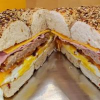 New The Longhorn Sandwich · Eggs, sausage, bacon, ham, cheddar, and American cheese.