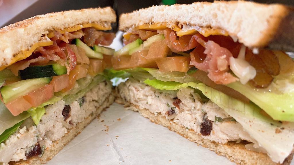 Chicken Salad Club · Chicken salad (house or classic), cheddar, bacon, romaine and tomato.