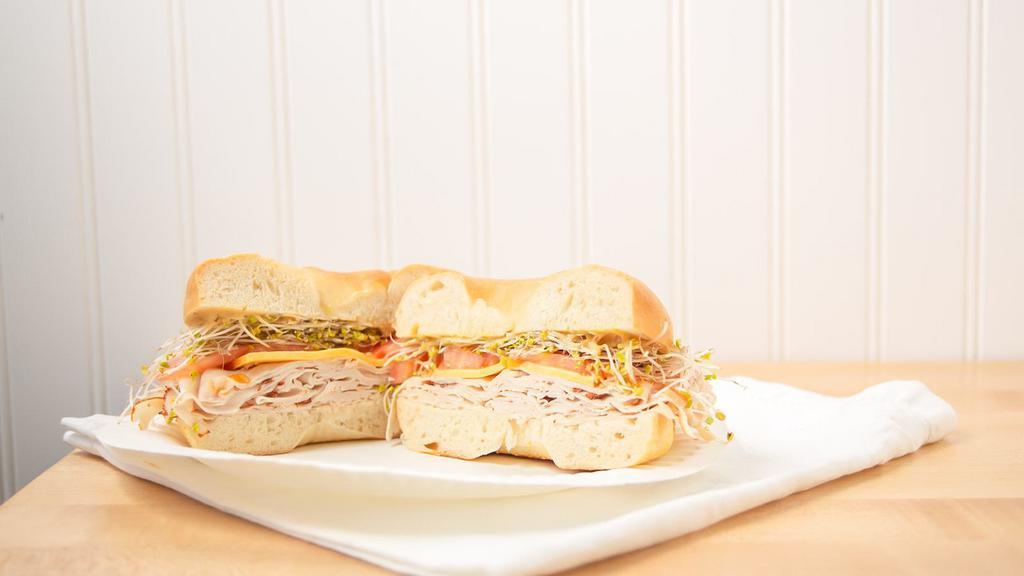 Turkey Time · Turkey, muenster, sprouts, tomato and honey mustard.