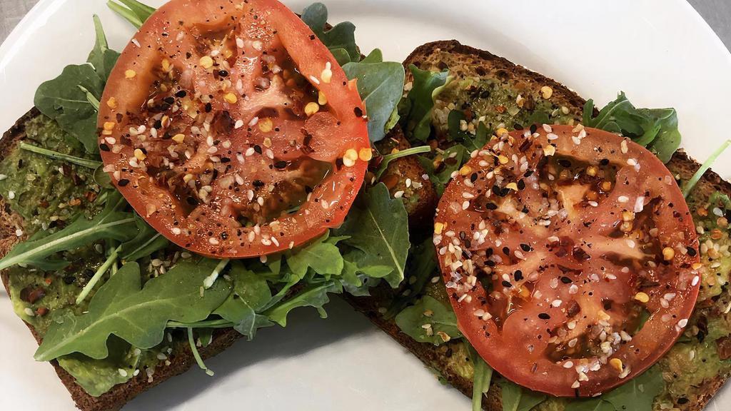 Avocado Toast · One slice or two. Whole wheat bread, topped with avocado, tomato, arugula, EVOO, and Everything Bagel Seasoning