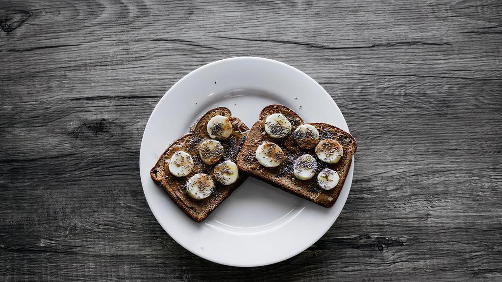 Almond Butter Toast · One slice or two. Whole wheat bread, topped with almond butter, banana, chia seeds, cinnamon, and honey.