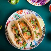 Shrimp Taco · Tasteful taco made with Sea Fresh Shrimp, Fresh Avocado, Chayote Slaw, Corn Tortilla and Chi...