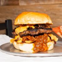 Frito Pie Burger · Texas classic meets burger 1/3 Lb beef topped with fritos, chili, queso, grilled jalapeños, ...