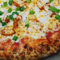 Chicken Tikka Pizza · Grilled tandoori chicken, fresh green peppers and onions.