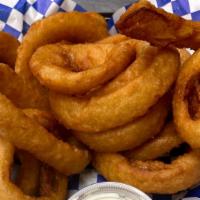 Onion Rings · Crispy onion rings with a side of Ranch