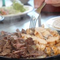  Sizzling Fajitas · Tender, juicy strips of char-broiled Beef or Chicken with sauteed peppers and onions. Served...