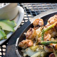 Shrimp Fajitas · Plump and delicious, perfectly seasoned shrimp  with sautéed bell peppers, onions, and chive...