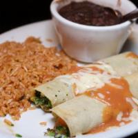 Vegetable Enchiladas  · A mix of lightly seasoned grilled veggies and melted Chihuahua cheese rolled inside soft cor...