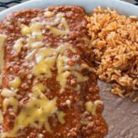 Dinner #3 · An Alamo Cafe favorite! Two enchiladas, tostada con queso, rice, and refried beans.