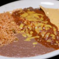 Dinner #6 · One enchilada, tostada con queso, rice, and refried beans. 
Your choice of beef, chicken, gr...