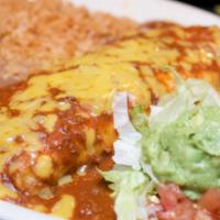 Burrito Dinner · Fresh flour (or wheat) tortilla filled with beef smothered in chile con carne or chicken smo...