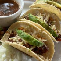 Street Taco Dinner · Alamo Cafe favorite. Beef fajita meat, tossed in chipotle sauce and pico de gallo. Served in...