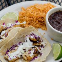 Fish Taco Dinner · Seasoned pieces of tilapia grilled to perfection, served in our homemade corn tortillas, wit...