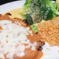 Chicken Ranchero · Charbroiled chicken breast, covered with ranchero sauce and Monterey Jack cheese. 
Served wi...