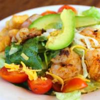 Shrimp Avocado Salad · Plump, delicious, perfectly seasoned shrimp, Monterey Jack cheese, sliced avocados, black ol...