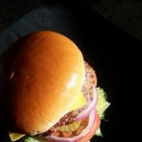 Box Burger · Mustard, lettuce, tomato, pickle, and onion.