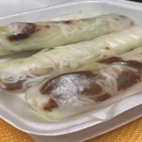 Vegetable Spring Rolls · Rice noodle, tofu, and lettuce wrapped in soft rice paper. Served with peanut sauce.