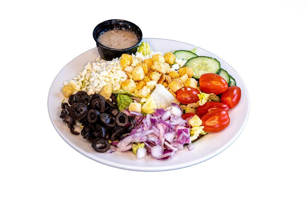 Greek Salad · Romaine lettuce, feta, grape tomatoes, cucumbers, onions, Kalamata, and Greek dressing.