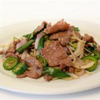 Mongolian Style Beef / 蒙古牛肉 · Hot and spicy.
