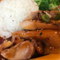 Chicken Teriyaki · Grilled chicken thighs marinated in a teriyaki sauce. Served with miso soup, rice, and brocc...