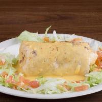 Macho Burrito · The best burrito north of the border!. Large flour tortilla filled with rice, beans and your...
