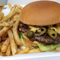 Jalapeño Cheeseburger · Grilled jalapeños, American cheese, mayo, lettuce, tomato, pickles, onions.