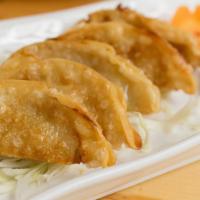 Gyoza (5) · Deep fried Japanese dumpling served with ponzu sauce.