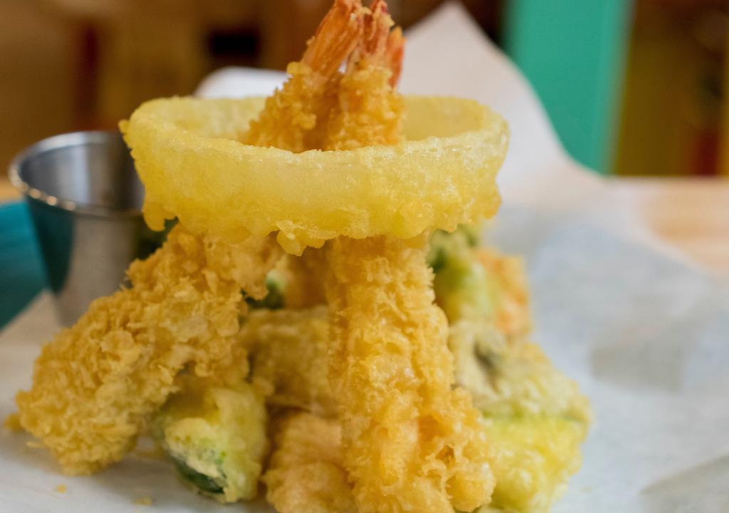 Tempura Shrimp · Fresh avocado, cucumber, lettuce, crab, tempura shrimp, topped with eel sauce. Six pieces.