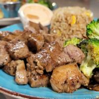New York Strip · Cooked with garlic butter, Served with broccoli, carrot, onion, zucchini, and mushroom.