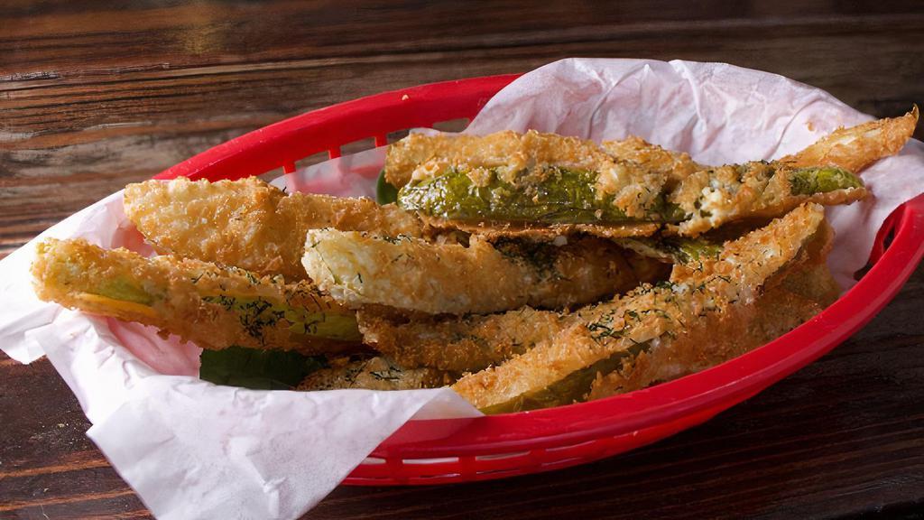 Fried Pickles · Panko breaded, deep fried to perfection, kosher dill pickle spears, served with vegan poblano ranch and celery sticks.