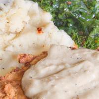 Chik-N Fried Chik-N · Battered and fried Chik-N filet smothered in cream gravy. Served with mashed potatoes and ka...