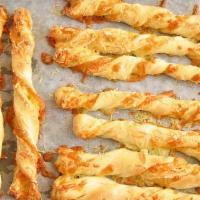 Bread Sticks With Cheese · 12 Pieces.
