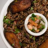 Veggie Rice Bowl · Steamed white rice, black beans, maduros, topped with sliced avocado and pico de gallo.