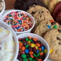 Family Pack Ice Cream Sandwich & Pints!! · This pack includes: 1 dozen (12) cookies, 2 pints of ice cream and 2 toppings.
Instructions:...