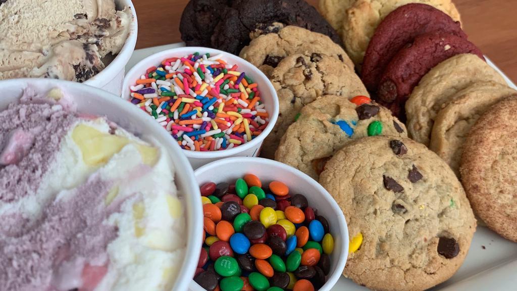 Family Pack Ice Cream Sandwich & Pints!! · This pack includes: 1 dozen (12) cookies, 2 pints of ice cream and 2 toppings.
Instructions: Choose your 12 cookie flavors, choose 2 ice cream pint flavors and choose 2 toppings! Done!