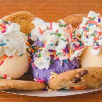 Smoosh Cookie Split - Our Version Of The Banana Split! · Choose 2 cookies, Choose 3 scoops of ice cream, Choose 2 FREE toppings + Whipped Cream (opti...