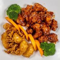 Dragon & Phoenix。龙凤配 · Spicy. Walnut shrimp and General Tso's chicken.