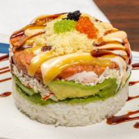 Ahi Tower Roll 。辣吐拿塔 · Sushi rice, avocado, crabmeat mix, spicy tuna, caviar with chef special sauce.