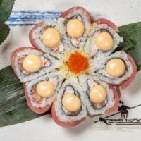 Cherry Blossom Roll。樱桃卷 · Spicy. Salmon, crabmeat mix wrapped topped with tuna and spicy mayo.