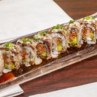 Texas Cowboy Roll。牛仔卷 · Spicy crabmeat, avocado, crunchy wrapped topped with seared steak, peach sauce and ponzu sau...