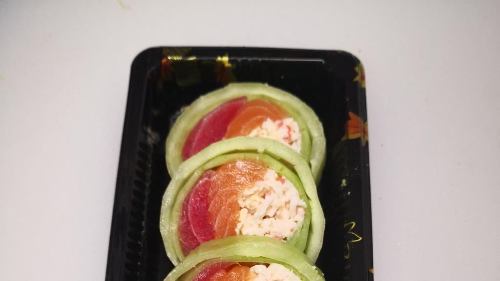 Naruto · Salmon tuna avocado and imitation snow crab inside wrapped with cucumber drizzled with chef special naruto sauce.