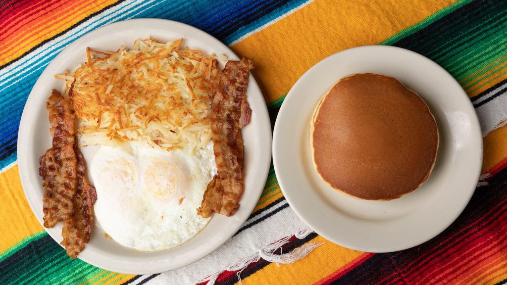Combo Plate  · 2 eggs, hashbrowns, choice of breakfast meat, and served with choice of 2 pancakes or toast